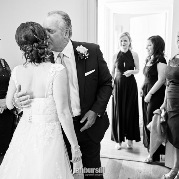 Braxted Park Ian Bursill wedding photographer bride kiss